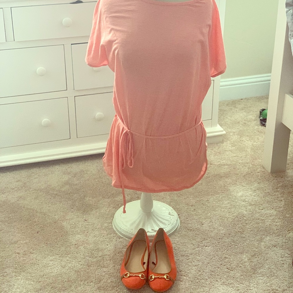 Orange, and white striped shirt. orange shoes.